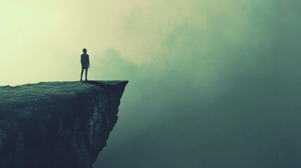 a shadowy figure standing on an edge of a cliff staring into the distance viewed from behind   