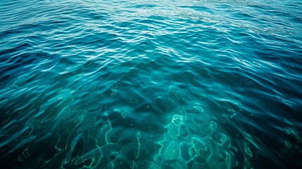 Blue green surface of the ocean in Catalina Island California with gentle ripples on the surface and light refracting    - obrazy, fototapety, plakaty