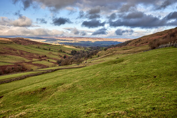 View looking north towards Wensleydale across West Burton from the single tracked road to Walden in North Yorkshire