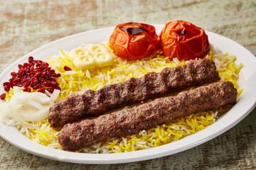 chelo kebab, chalo kabab or cheelo with mandi biryani rice served in dish isolated on table top...