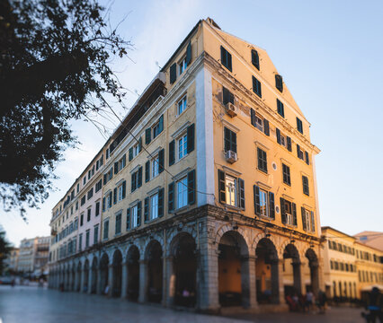 Fototapeta Corfu street view, Kerkyra old town beautiful cityscape, Ionian sea Islands, Greece, a summer sunny day, pedestrian streets with shops and cafes, architecture of historic center, travel to Greece