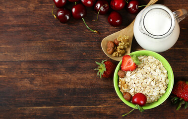 healthy breakfast with whole grain porridge and fresh berries