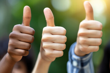 Multiracial team of people showing thumbs up together. Group of happy multiethnic male and female colleagues doing thumbs up gestures. Teamwork concept - obrazy, fototapety, plakaty
