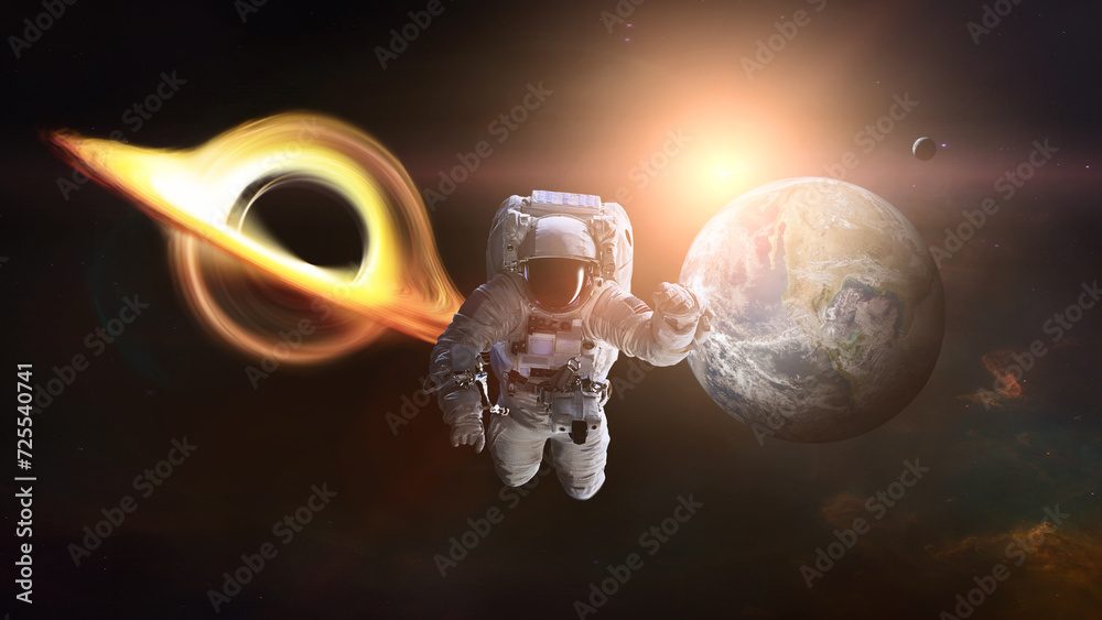 Wall mural spaceman in outer space with black hole and earth planet. elements of this image furnished by nasa.