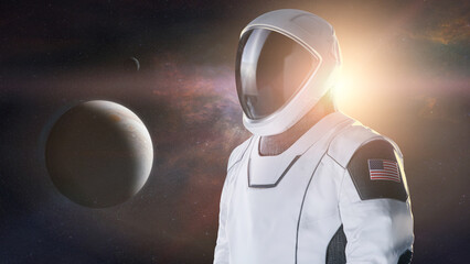 Astronaut in outer space on background of alien planet. Exploration theme. Elements of this image...