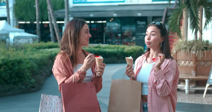 On city street women savor ice cream sharing lively emotions Ice cream catalyst for happiness. Ice cream essence of delectable friendship sweet life Relishing tasty moments cheerful friendship.