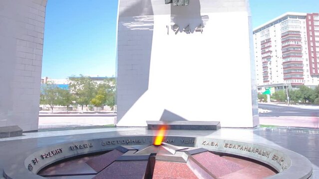 Timelapse Hyperlapse of Mangistau Heroes' Portraits at the Eternal Flame in Aktau, Kazakhstan. Honoring Great Patriotic War Heroes in Mangystau's Eternal Tribute
