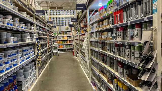 Moscow, 13 January 2024, Large selection of spray paint in the store, Paint in aerosol cans on supermarket counter. A large and varied selection of paints of all colors and shades in the supermarket