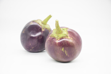 Eggplant or aubergine or brinjal isolated on black background