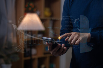 Men's hands on the table use mobile phones, technology, communications, the Internet.