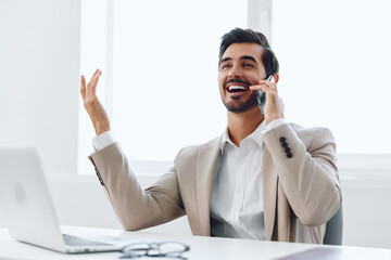 Businessman man happy smile phone telephone laptop talk wireless computer winner office