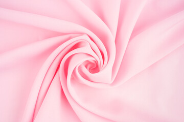 Pink fabric texture as a background.
