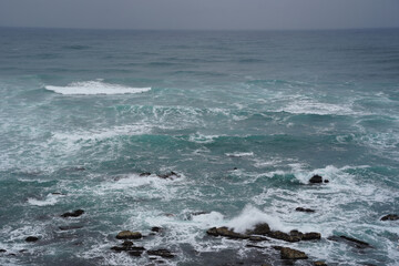 Fototapeta premium The distant horizon and the wavy winter sea