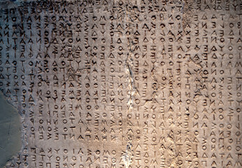 ancient greek letters in stone