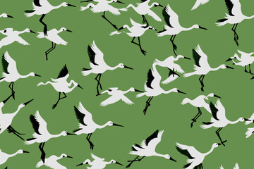 Flying cranes flock - side view. Seamless pattern design in color pallet