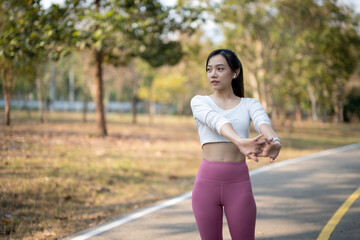 Woman stretching before jogging Health and lifestyle.