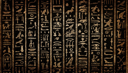 Old Egyptian hieroglyphs on an ancient background. Wide historical and culture background. Ancient Egyptian hieroglyphs as a symbol of the history of the Earth.