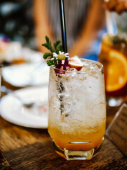 Refreshing non-alcoholic drinks in glasses with ice. Juice, homemade lemonade, iced coffee, iced fruit tea and smoothies.