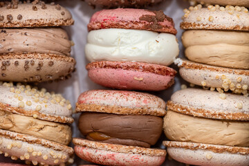 Sweet hand made macarons as delicious french dessert background