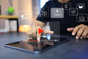 Video lesson on tablet screen with student touch to scroll seeking bar select play for continue to...