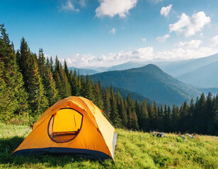 Tourism and traveling concept. Beautiful summer landscape with mountain forest and tourist tent.