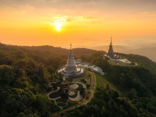 Arieal view. Twin pagoda built on top of the mountain Doi Inthanon at Chiang Mai in the North of Thailand during sunrise scene. mountain Doi Inthanon Chiang Mai of Thailand. King and Queen Pagodas.