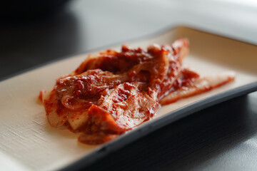 Korean food Kimchi, Kimchi in a white plate.