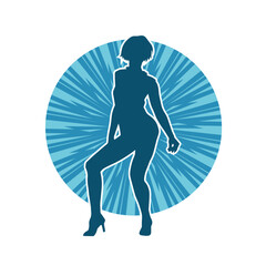 Silhouette of a slim female in dance pose. Silhouette of a woman dancing.