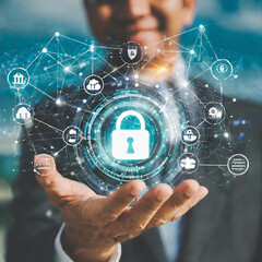 Businessman hand-holding information security icons with cybersecurity and a network connection. Safeguarding digital assets and ensuring the growth of secure data management and resilient businesses.