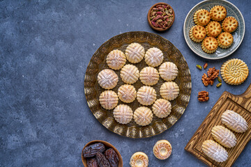 Arabic sweets. Traditional eid semolina maamoul or mamoul cookies with dates , walnuts and...