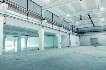 Interior of a New Industrial Building Under Work. Heat and Ventilation Pipes