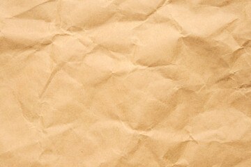 Abstract crumpled and creased recycle brown paper texture background