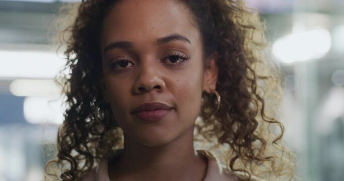 Woman, face and serious expression with headshot, unbothered and neutral with emotionless student. Young, model in portrait and stern, staring ahead or looking with calm and ordinary while alone
