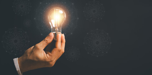 success businessman hold light bulb for good idea. brainstorming creative.Idea innovation and...