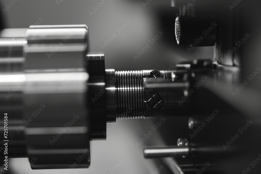 Poster A detailed view of a machine in action. This image can be used to depict industrial processes or showcase the inner workings of technology
