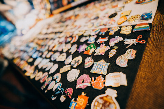 Table with Badges in the street market