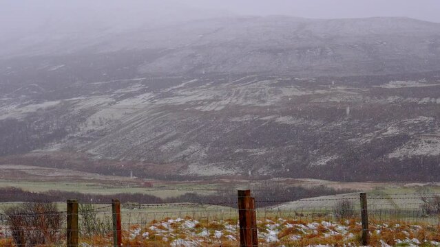 View of beautiful countryside in the Scottish highland with mountains, trees and sea