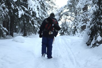 Fototapeta na wymiar hiker in the snow