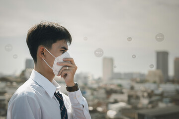 air pollution quality of dust PM 2.5 is toxic and dangerous to health..Business man wearing...