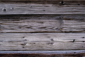 The texture of old wooden planks. Deep textured board.