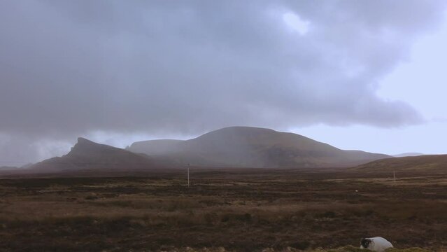 Car point of view, POV driving along a landscape and scenery through beautiful roads in the Scottish highland.