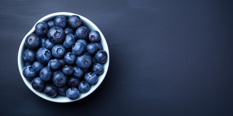 Ceramic Bowl with Blueberries on Blue Background with Copy Space. Organic Vegetarian Food. Generative AI