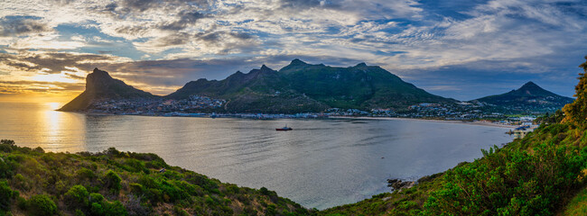 Hout Bay town and the fishermans village during a colorful sunset, Cape Town, South Africa