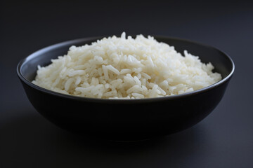 Sparse Cooked Rice on Black Platter