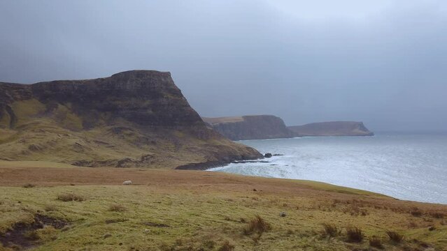 Car point of view, POV driving along a landscape and scenery through beautiful roads in the Scottish highland.
