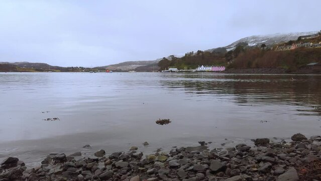 View of beautiful countryside in the Scottish highland with mountains, trees and sea