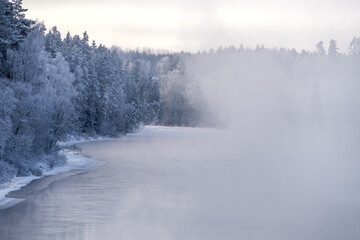 "Winter's Embrace: Mist Over the Serene River"
"Mystical Waters: Fog Dancing Above the Winter River"
"Enchanted Riverbanks: A Foggy Winter Landscape"