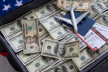 Open suitcase with one million dollars bills stacks