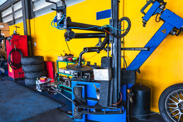 Tire testing machine in tire repair and maintenance shop