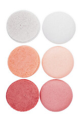 Flying sweet macaroons on white background